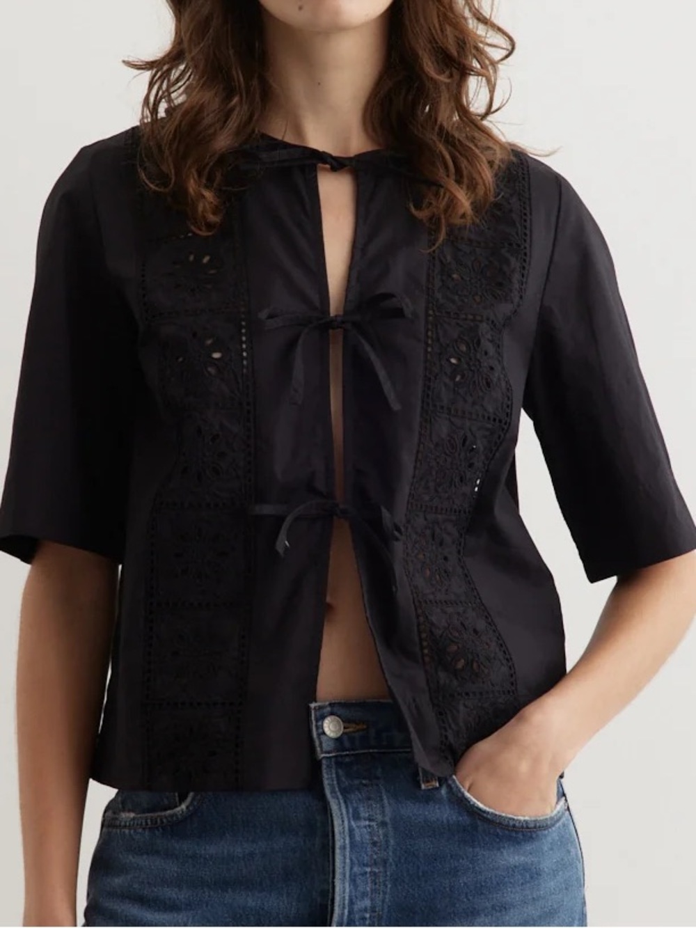 Ganni Black “Broderie Anglaise” Eyelet Tie-Front Blouse